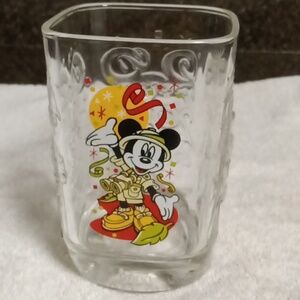 A Y2K McDonald's commemorative glass of Walt Disney World 2000